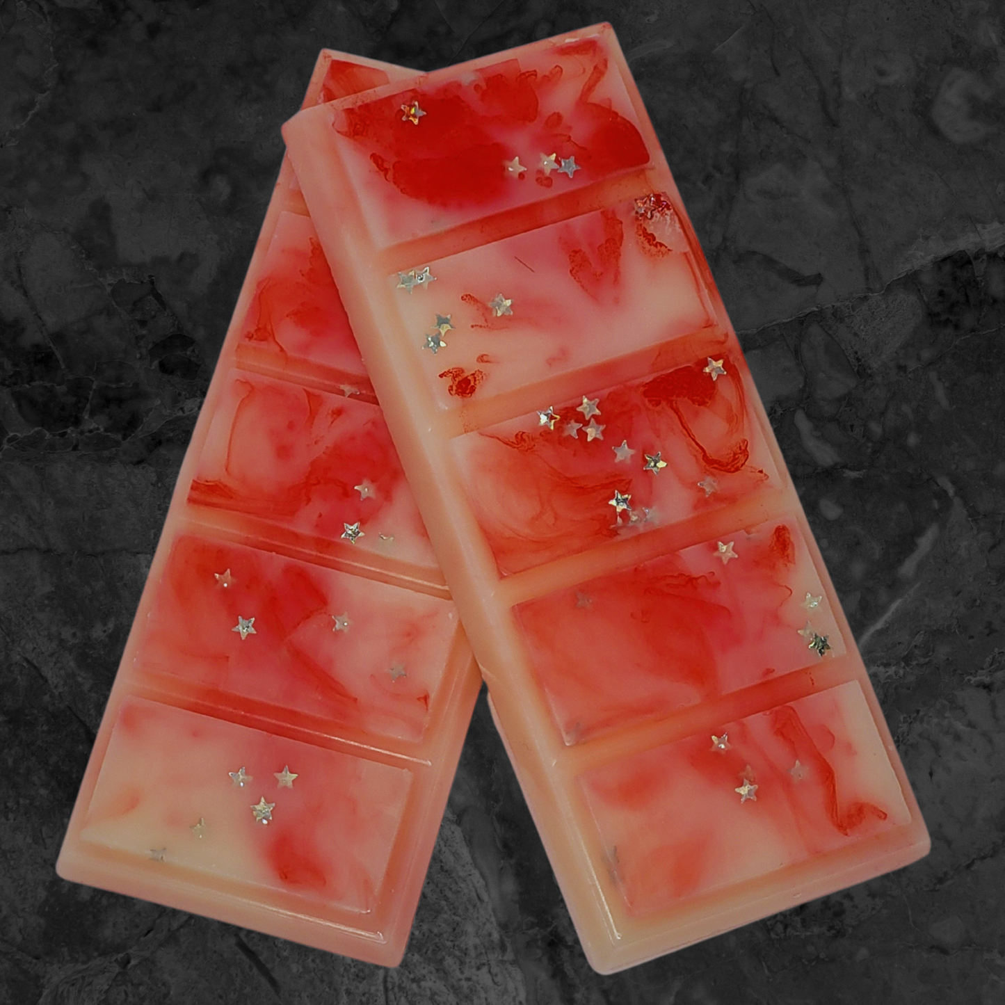 Peppermint Candycane soy wax snap bar melt. Cream and red wax with silver star bio glitter throughout.